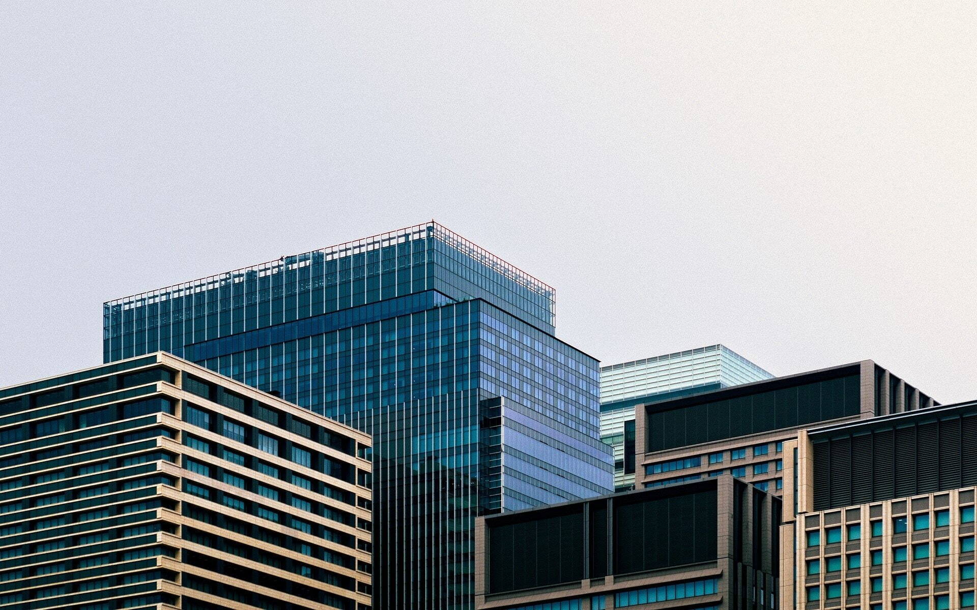 Footer image of city building rooflines